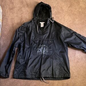 Disney Parks unisex Black Nylon windbreaker/ rain Jacket sz L lNever worn
